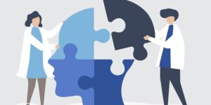 people connecting jigsaw pieces head togetherW900